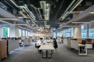 Man and Woman working at Table as a Finance Director